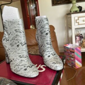 Fun silver glitter boots! Brand new